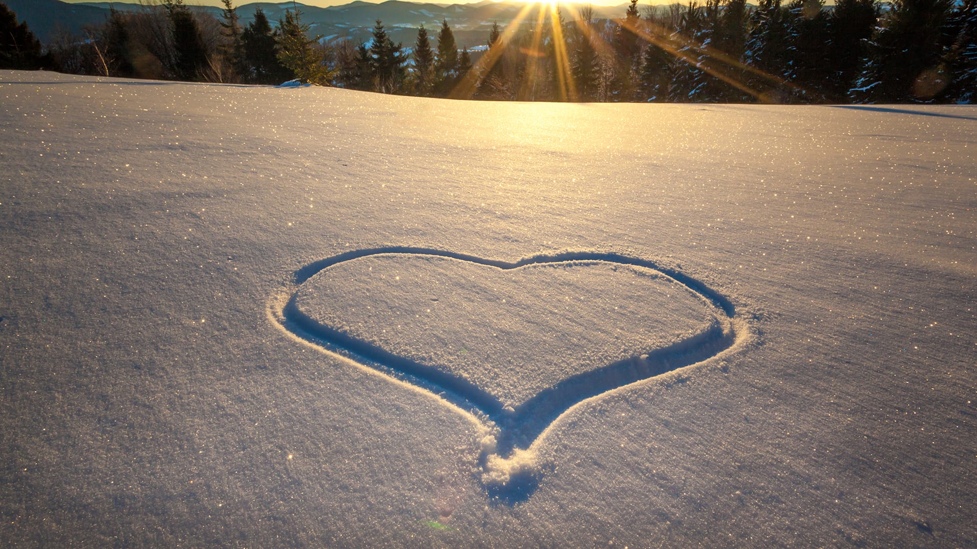 Heart trampled on the snow with feet